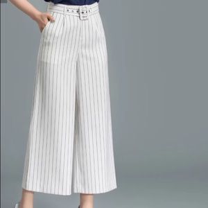 Suit trousers with belts